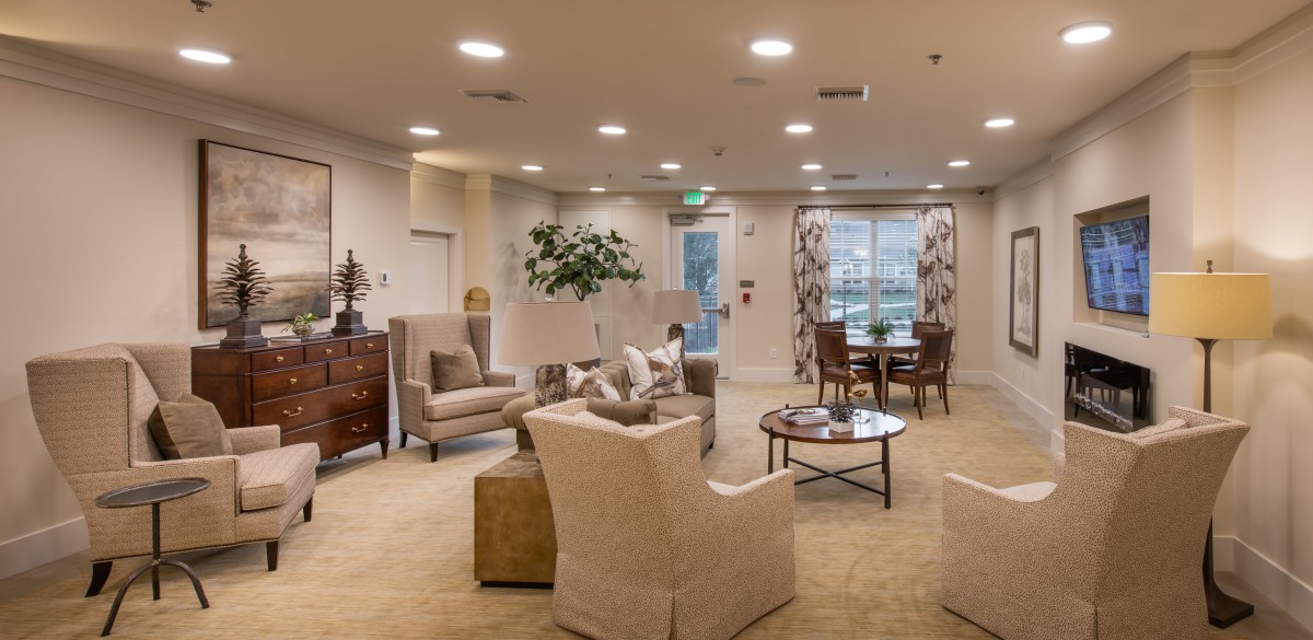 A cozy living room with comfortable seating and elegant decor.