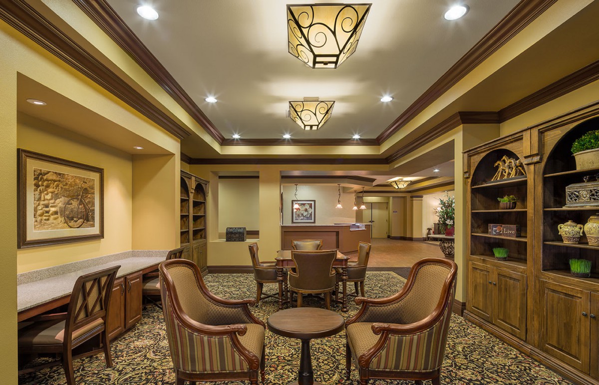 A hotel lobby with elegant seating and warm lighting.