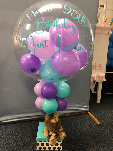 A festive balloon arrangement perfect for a birthday celebration!