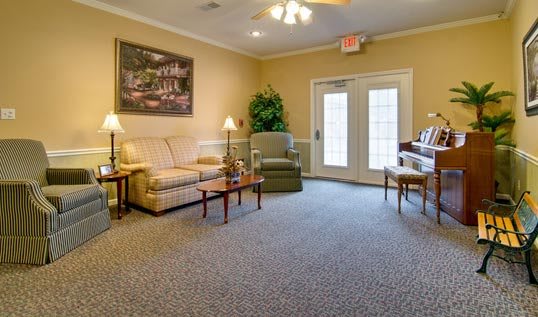 A cozy lobby area with comfortable seating and warm lighting.
