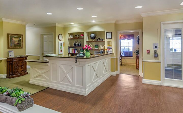 A welcoming reception area with a front desk and cozy interior design.