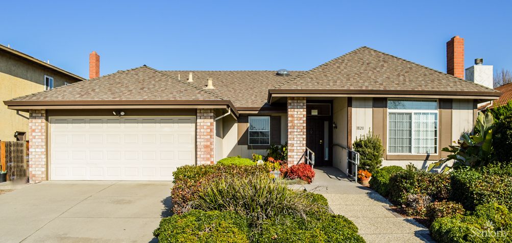 A charming suburban house with a well-maintained garden.