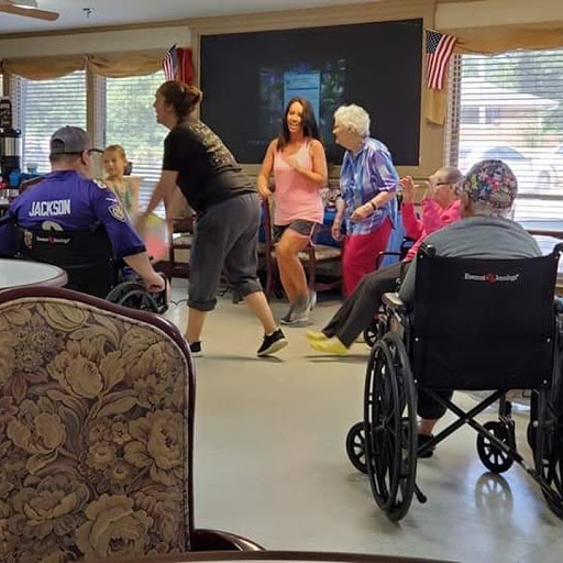 Residents engage in a lively dance performance at the senior center.