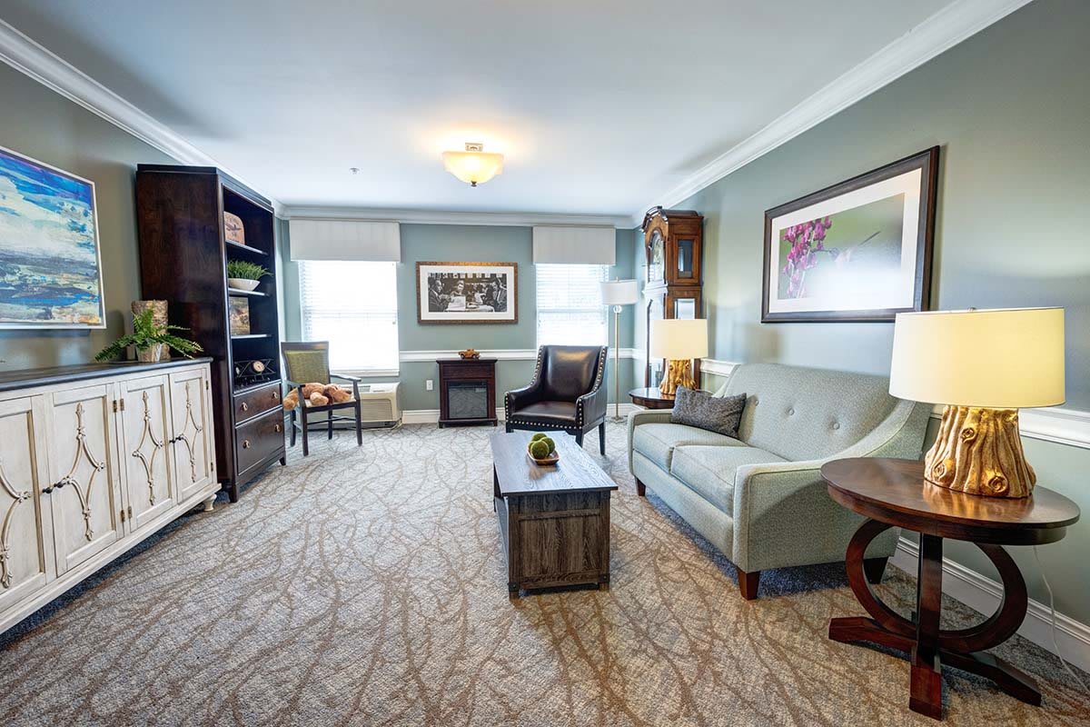 A cozy living room with elegant furnishings and a serene atmosphere.