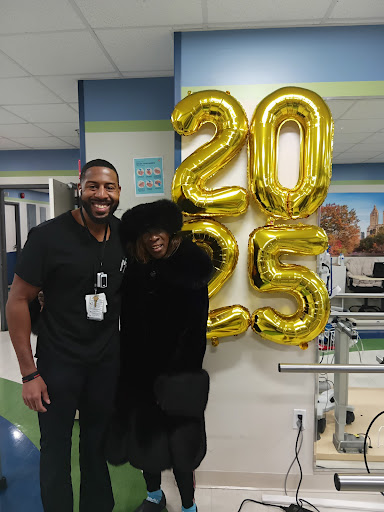 Celebrating a special moment in the hospital with balloons for the year 2025!