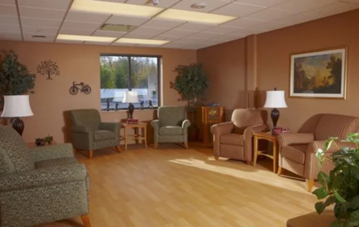 A cozy waiting room with comfortable seating and natural light.
