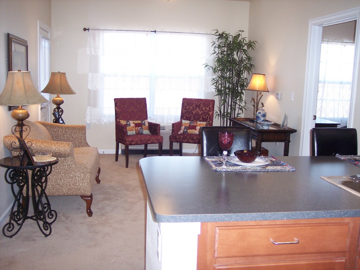 A cozy living room with comfortable seating and stylish decor.