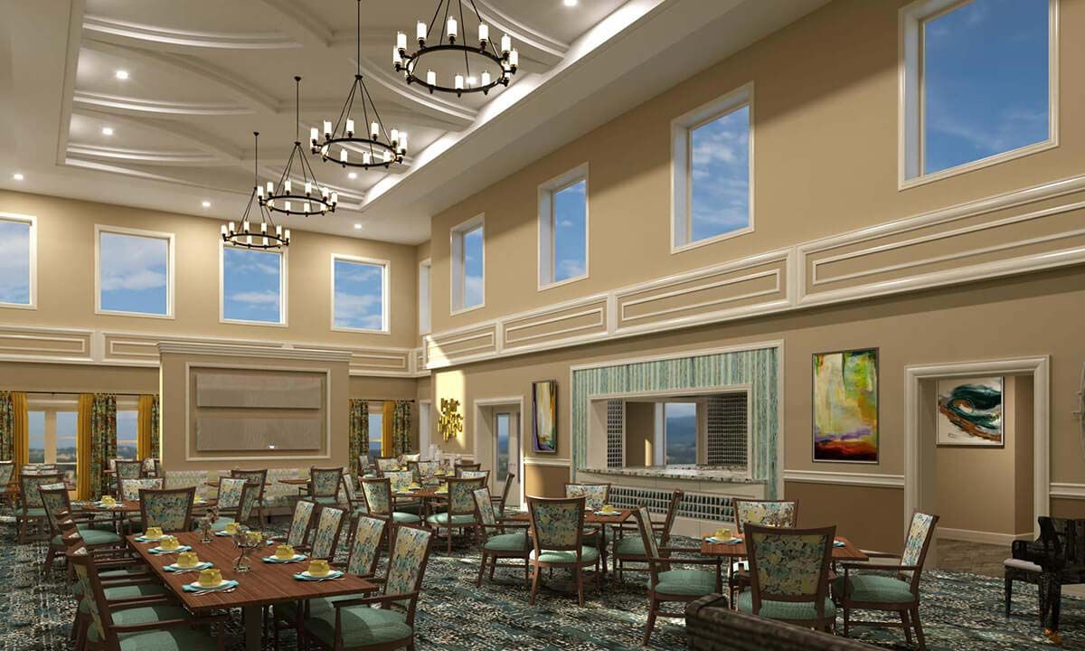 A spacious dining area with elegant chandeliers and high ceilings, featuring a variety of seating and large windows.