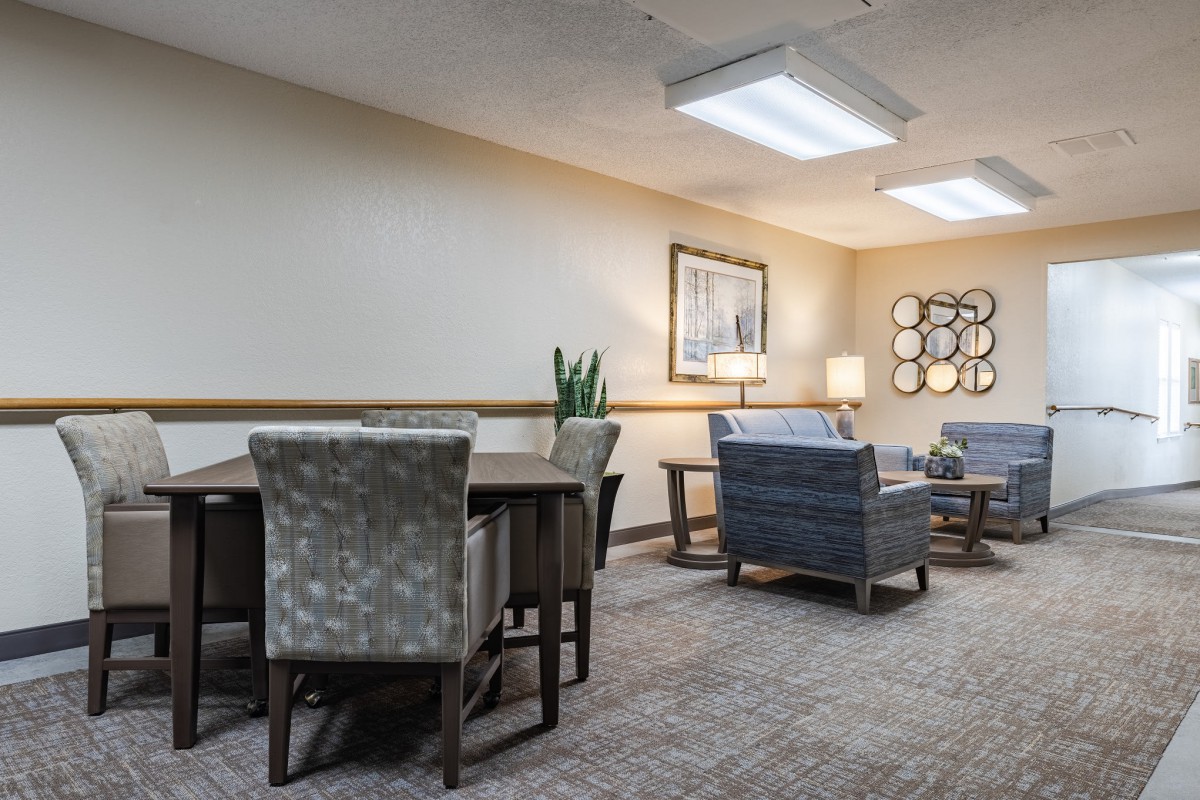 A cozy living room with comfortable seating and elegant decor.