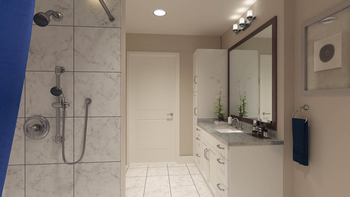 A modern bathroom featuring a large mirror, sleek sink and cabinet, tiled flooring, and a spacious shower area.