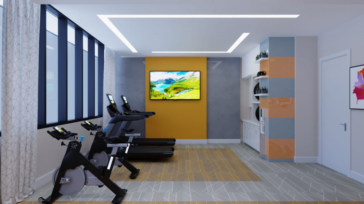 A modern gym interior featuring treadmills and a TV screen.