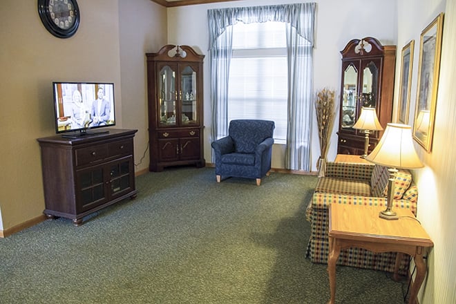 A cozy living room featuring classic furniture and decor.