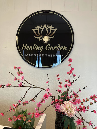A serene and inviting space at Healing Garden Massage Therapy, featuring beautiful floral arrangements.