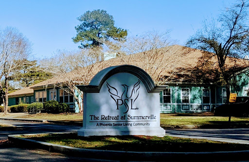 The sign of an educational institution, highlighting its name and welcoming visitors.