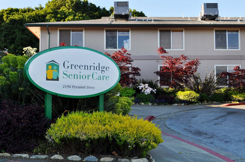 An exterior view of Greenridge Senior Care with well-maintained landscaping.
