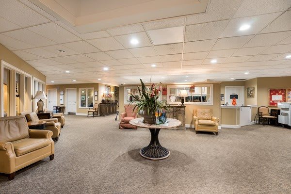 A spacious lobby with comfortable seating and elegant decor.
