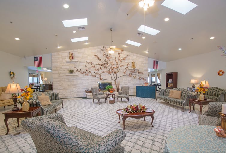 A spacious and elegantly designed lobby with comfortable seating and bright lighting.