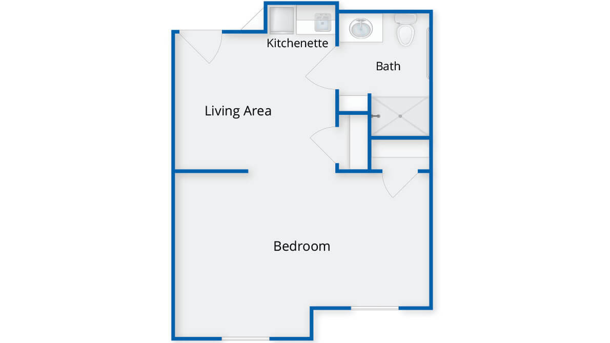 Studio apartment floor plan with living area, bedroom, kitchenette, and bath.