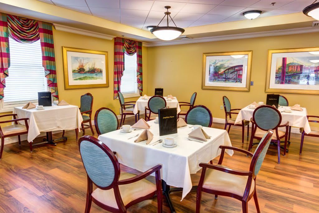 A well-decorated dining area with tables set for meals.