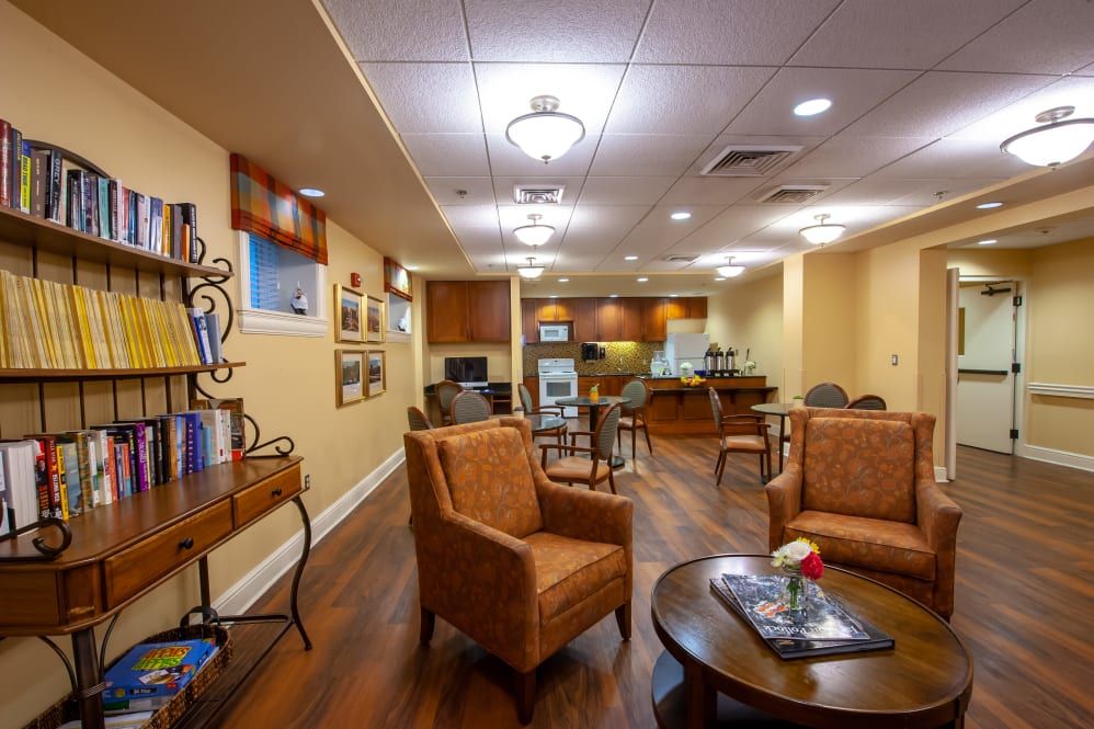 Cozy and well-decorated lounge area with comfortable seating and warm lighting.