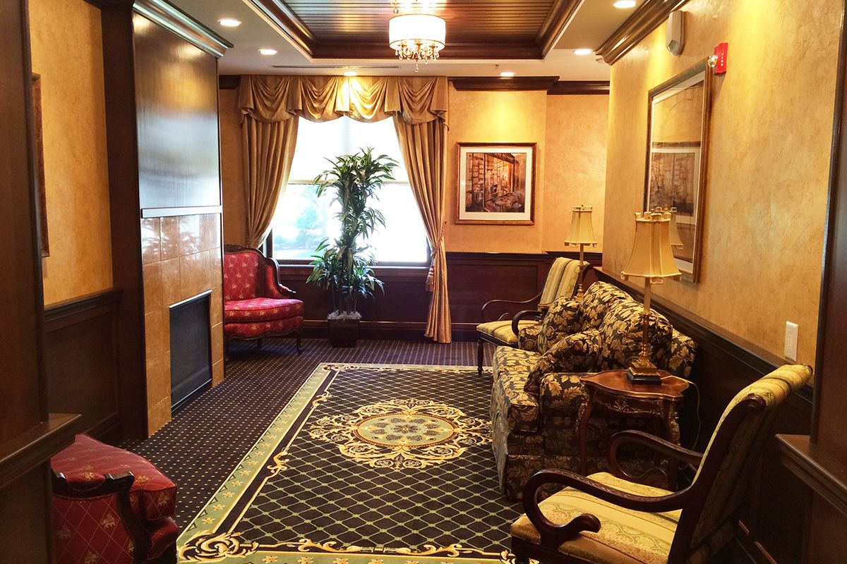 Elegant living room with classic decor and luxurious furnishings.