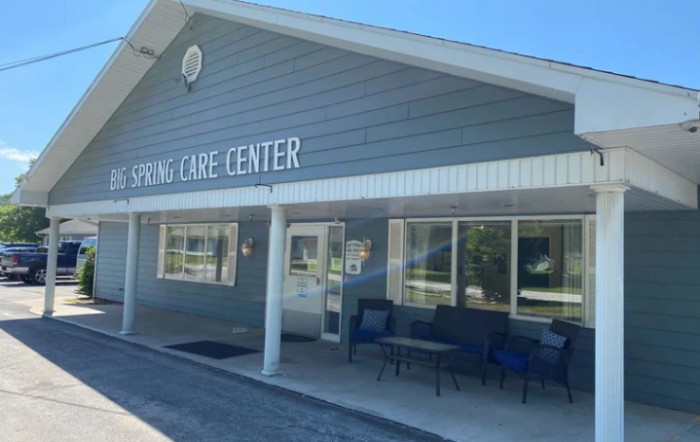The exterior of a care center building during the day.