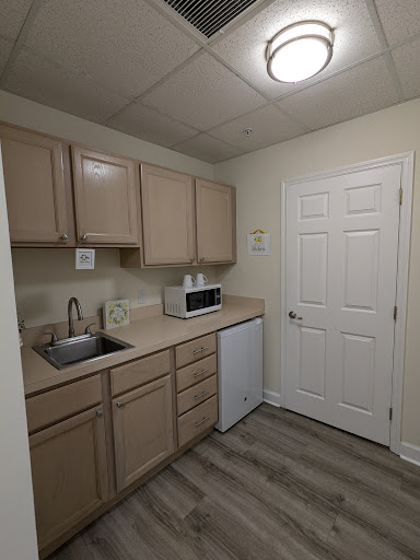 A cozy and functional kitchen space with modern amenities.