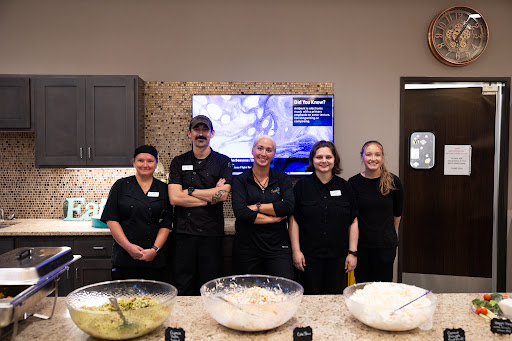 A dedicated kitchen team ready to serve delicious meals.