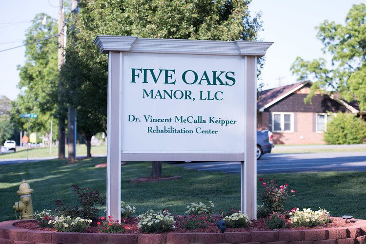 Sign for Five Oaks Manor, LLC, Dr. Vincent McCella Knipper Rehabilitation Center.