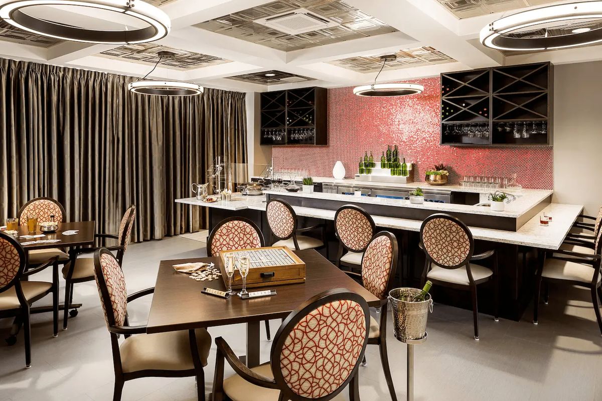 A stylishly designed restaurant dining area with elegant furnishings and modern decor.