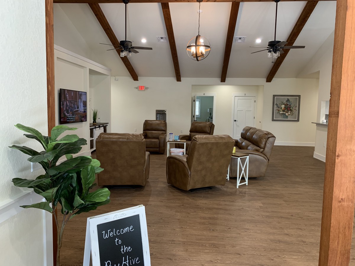 A welcoming lobby with comfortable seating and a rustic design.