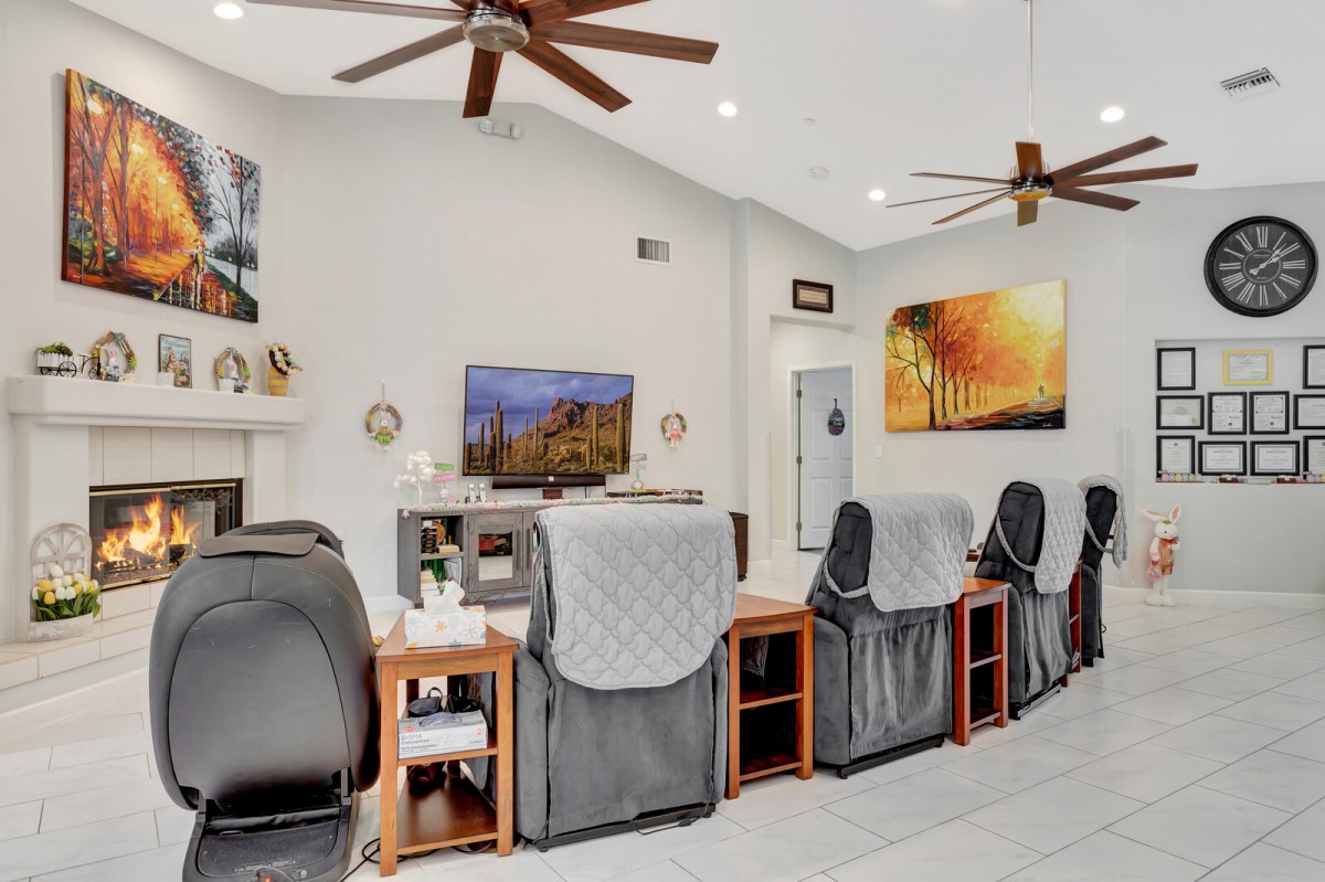 Modern nail salon interior with pedicure chairs and stylish decor.