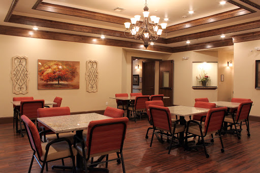A cozy and well-decorated dining area featuring comfortable seating and ambient lighting.