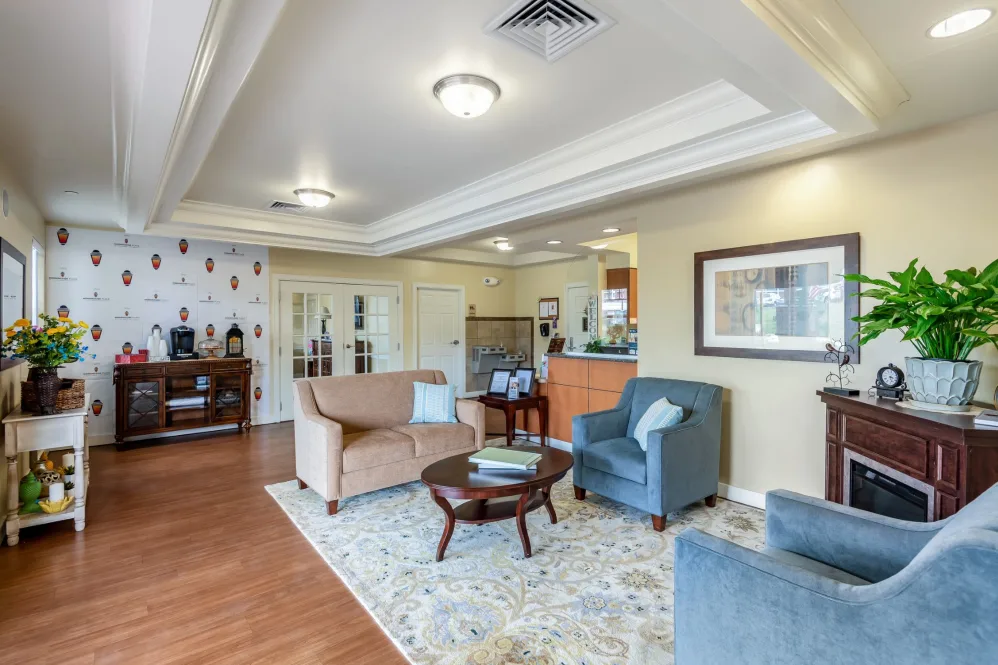 A well-furnished living room with comfortable seating and tasteful decor.