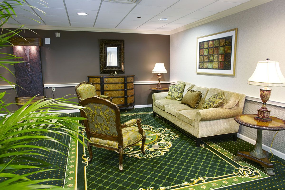 A cozy living room with elegant furniture and decor.