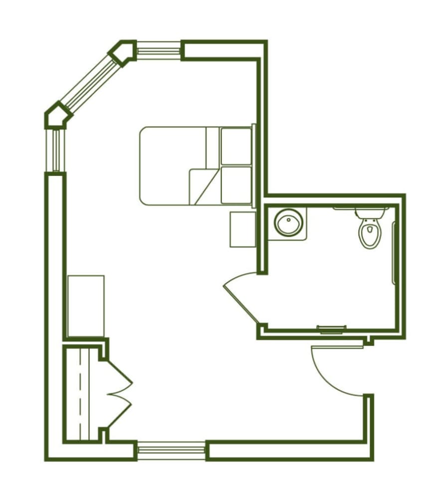 A simple floor plan depicting a small room with an attached bathroom.
