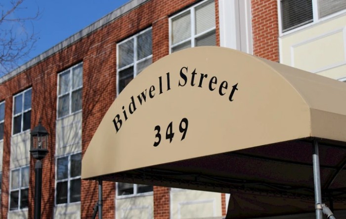 An awning displaying the address 'Bidwell Street 349' on a building.