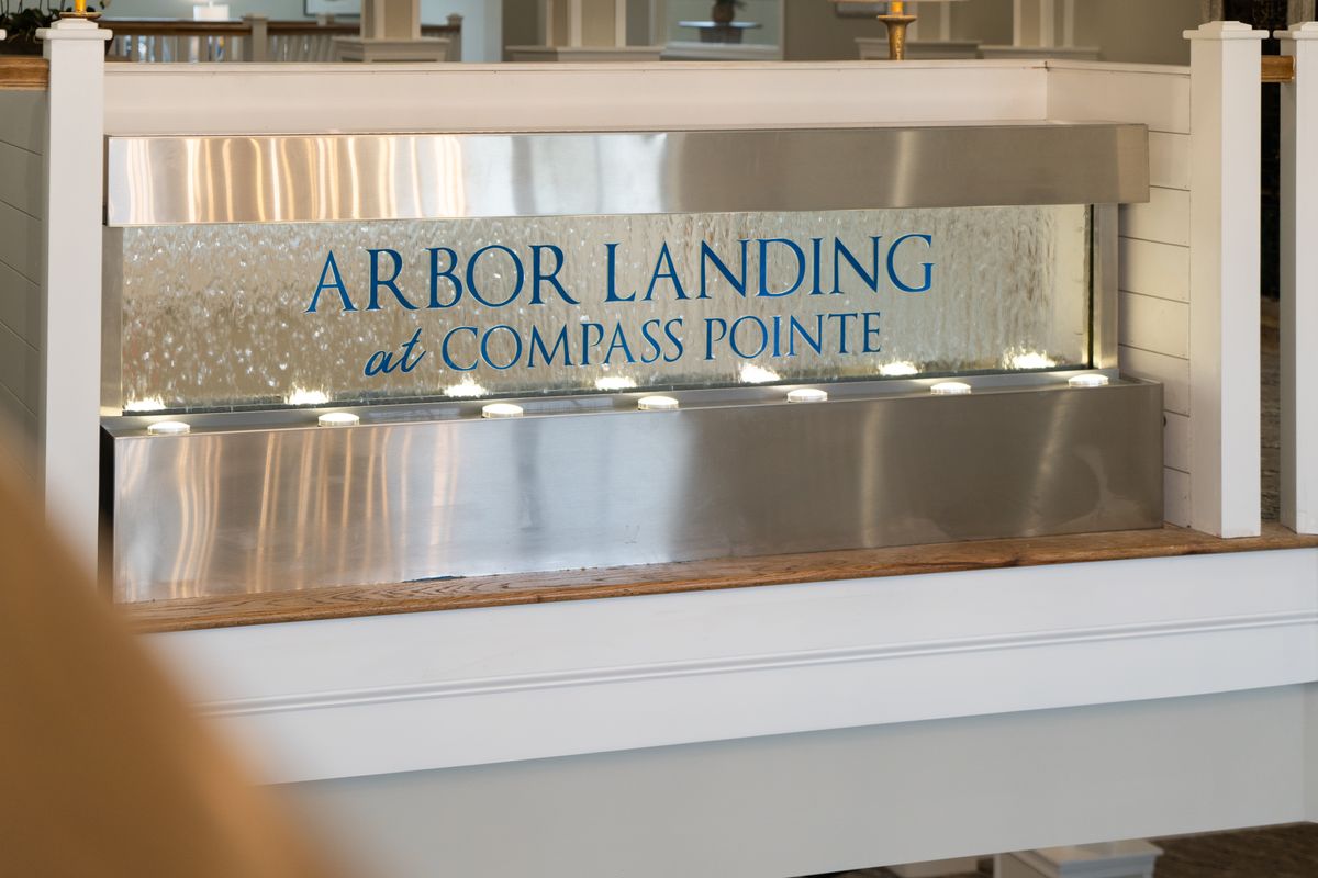 Interior signage for Arbor Landing at Compass Pointe.