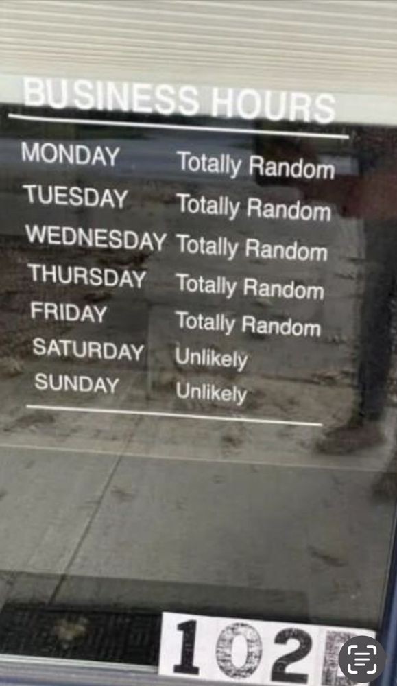 A humorous store sign displaying 'Totally Random' hours from Monday to Friday and 'Unlikely' on weekends.