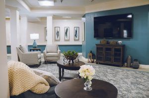 A modern living room with comfortable seating and stylish decor.