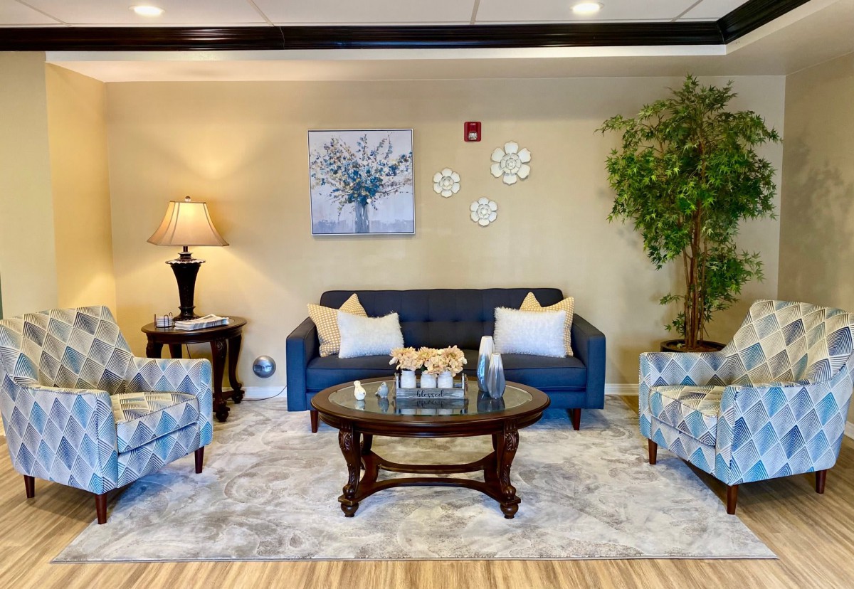 A cozy living room with stylish furniture and decor.
