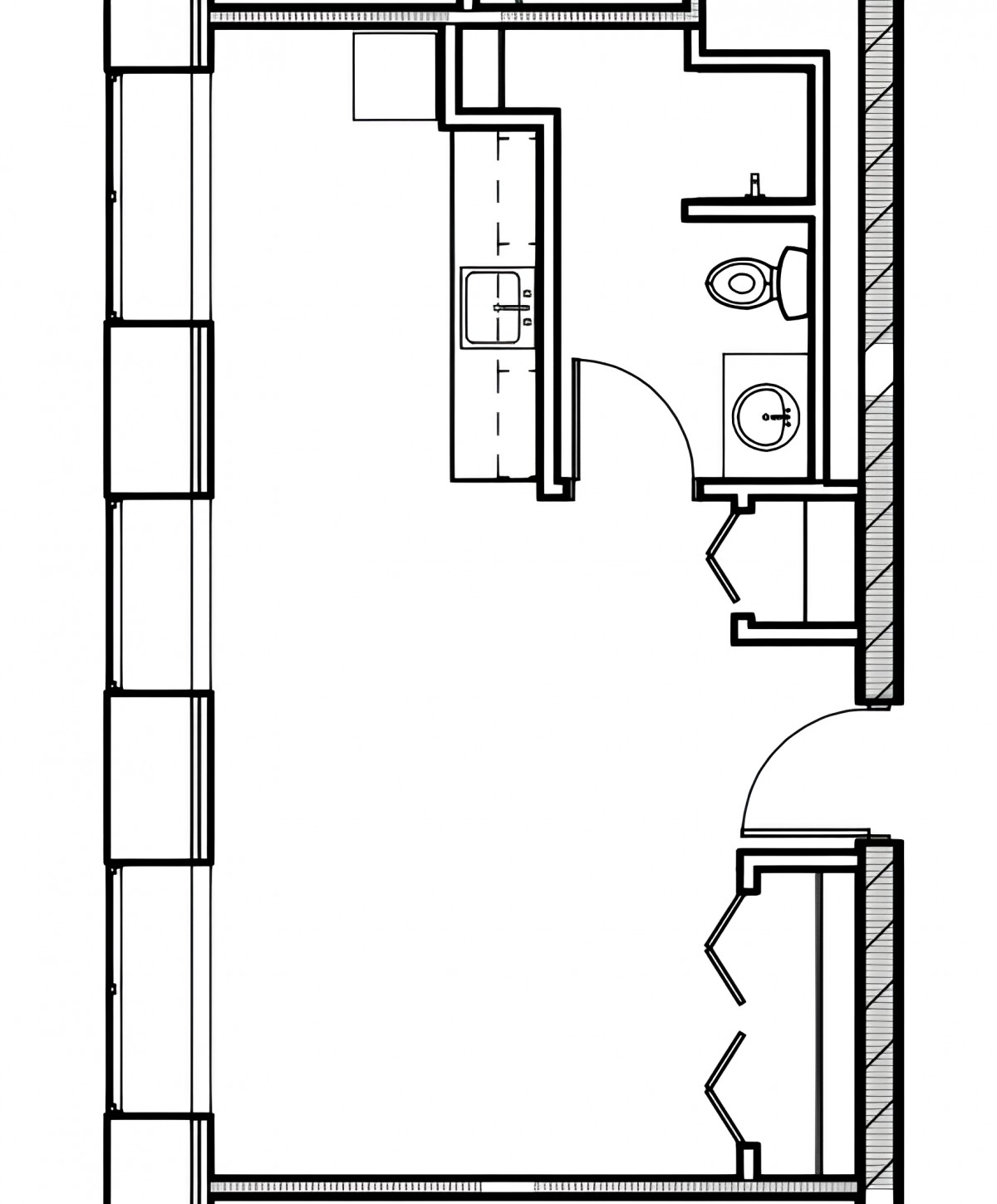 Architectural floor plan featuring a bathroom layout with a toilet and sink.