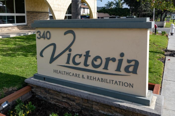 Sign for Victoria Healthcare & Rehabilitation facility.