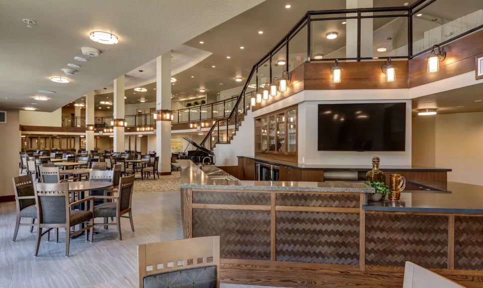 A modern restaurant interior with spacious seating and stylish decor.