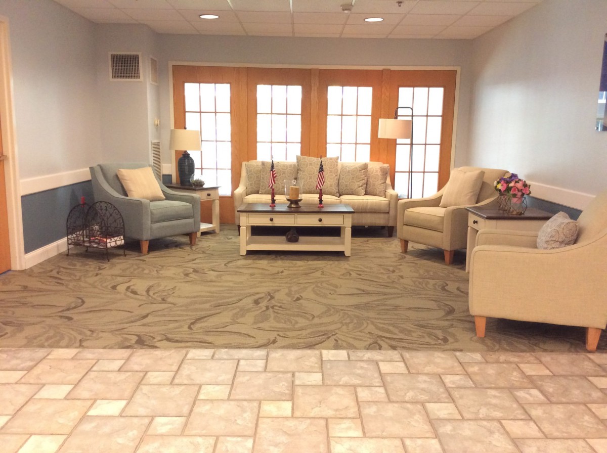 A cozy living room setup with sofas and a coffee table.