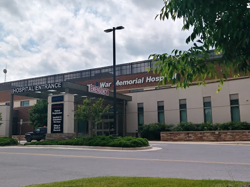 Exterior view of a healthcare facility with prominent signage.