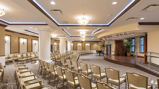 An elegantly designed conference room set up for an event.