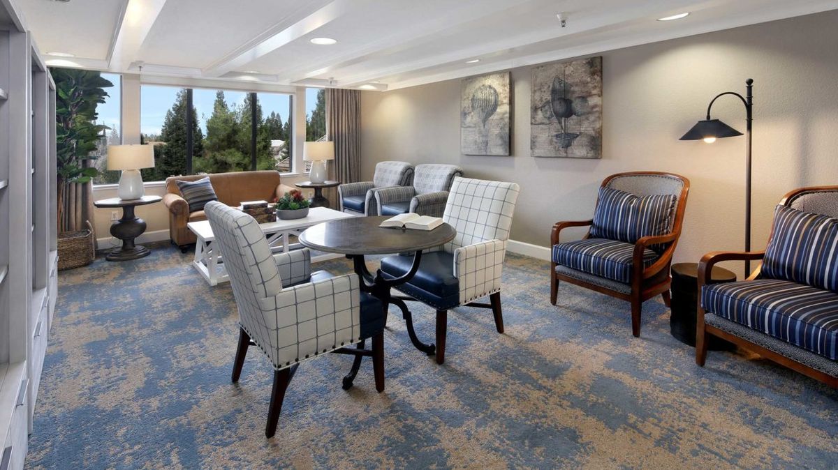 A modern lounge area with comfortable seating and stylish decor.