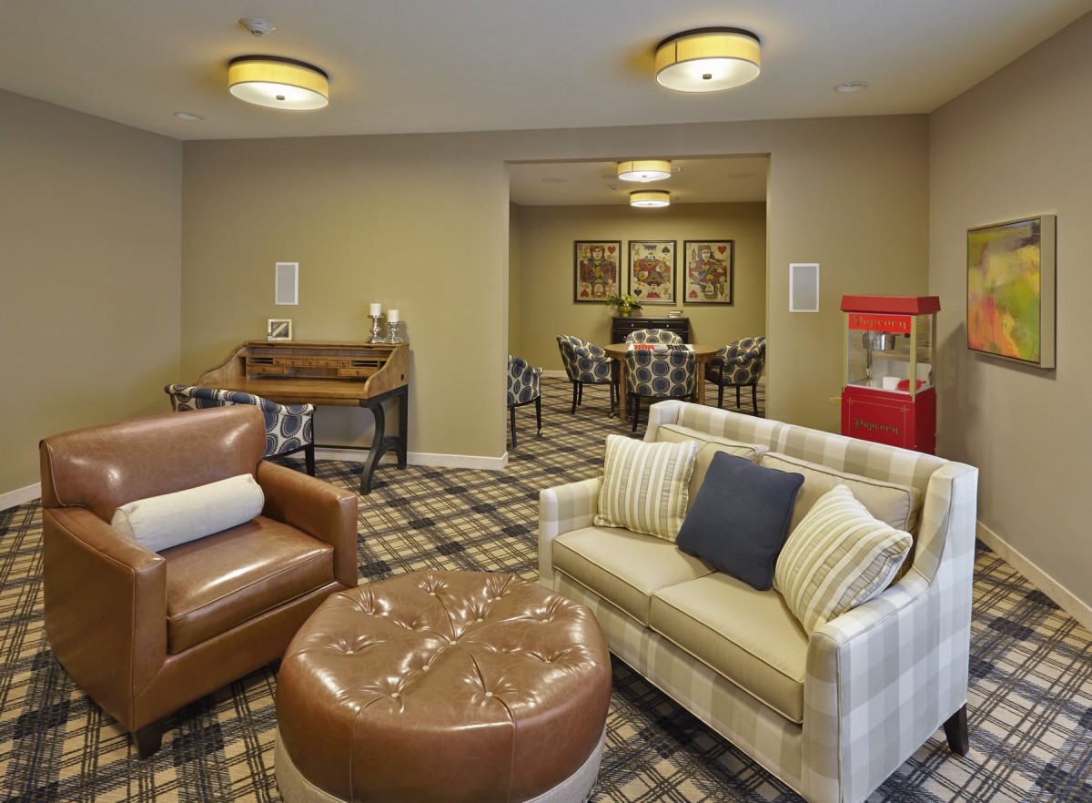 A cozy living room setup with comfortable seating and elegant decor.