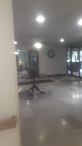 A view of the lobby with furniture and soft lighting.